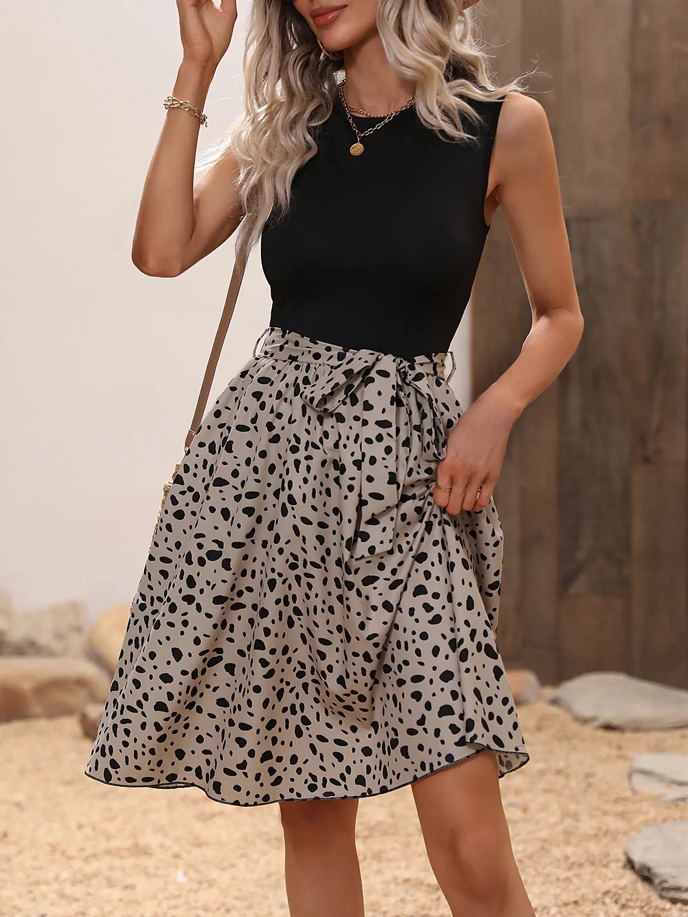 Sleeveless Black Top With High-Waisted Striped A-Line Skirt And Self-Tie Waistband For Summer Vacation